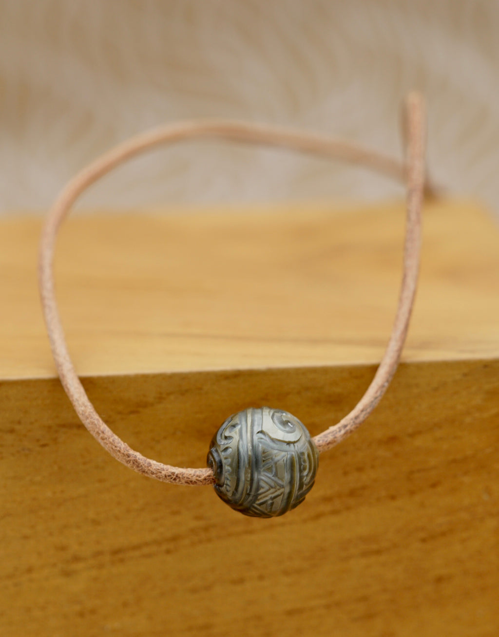 Nui iti perle de Tahiti de 14.1mm gravée